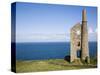 Old Stone Watchtower Along Coast-Roger Brooks-Stretched Canvas
