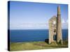 Old Stone Watchtower Along Coast-Roger Brooks-Stretched Canvas