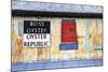 Old Tin Building with Red Shutters, Apalachicola, Florida, USA-Joanne Wells-Mounted Photographic Print