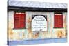 Old Tin Building with Red Shutters, Apalachicola, Florida, USA-Joanne Wells-Stretched Canvas