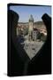 Old-Town Cityhall Tower Seen Through a Quatrefoil in the Stone Gothic Parapet of Týn Church's West-null-Stretched Canvas