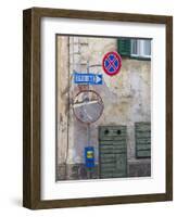 Old town house and traffic signs. Predazzo in valley Val di Fiemme, in the Dolomites Italy.-Martin Zwick-Framed Photographic Print