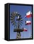 Old Water Pump and Texas State Flags, Amarillo, Texas-Walter Bibikow-Framed Stretched Canvas