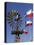 Old Water Pump and Texas State Flags, Amarillo, Texas-Walter Bibikow-Stretched Canvas