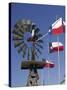 Old Water Pump and Texas State Flags, Amarillo, Texas-Walter Bibikow-Stretched Canvas