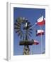 Old Water Pump and Texas State Flags, Amarillo, Texas-Walter Bibikow-Framed Photographic Print