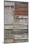 Old Weather-Beaten Rusty Corrugated Iron Siding Amidsts Wooden Slats on a Hut by Ore River England-Natalie Tepper-Mounted Photo