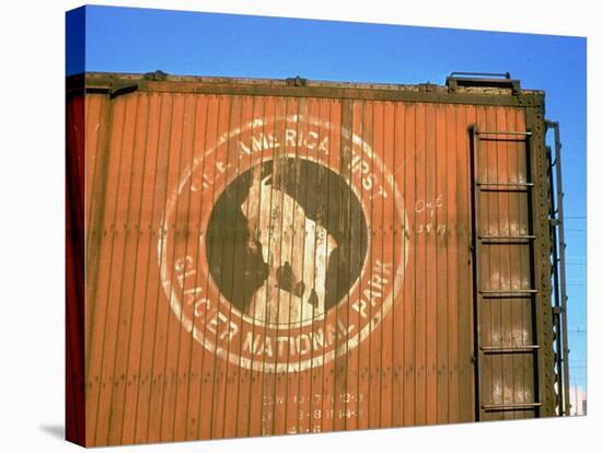 Old Weathered Box Car Showing Design Promoting Travel to Glacier National Park-Walker Evans-Stretched Canvas