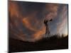 Old Windmill Silhouetted Against Clouds Colored by the Setting Sun-null-Mounted Photographic Print