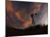 Old Windmill Silhouetted Against Clouds Colored by the Setting Sun-null-Mounted Photographic Print