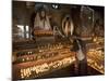 Old Woman Lighting Butter Lamps in Front of Buddha Statues Draped with New Silk Scarves-Don Smith-Mounted Photographic Print