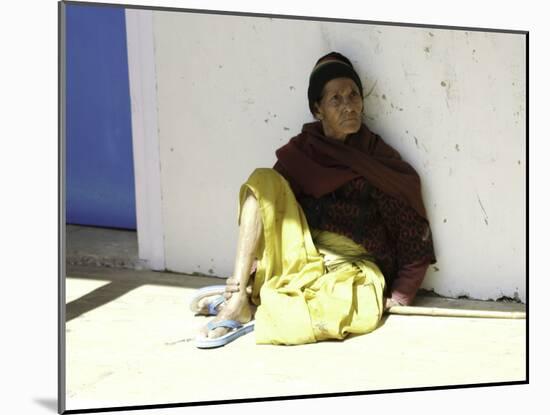 Old Woman Sitting Against a Wall, Nepal-David D'angelo-Mounted Photographic Print