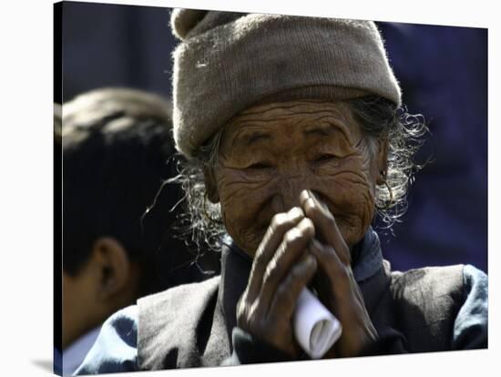 Old Woman with Hands to Face, Nepal-David D'angelo-Stretched Canvas