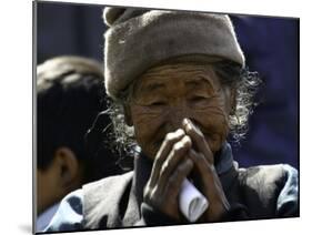 Old Woman with Hands to Face, Nepal-David D'angelo-Mounted Premium Photographic Print