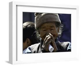Old Woman with Hands to Face, Nepal-David D'angelo-Framed Photographic Print
