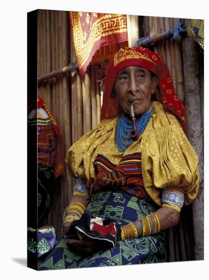 Old Woman with Pipe in Hand-Stitched Molas, Kuna Indian, San Blas Islands, Panama-Cindy Miller Hopkins-Stretched Canvas