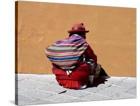 Old Woman with Sling Crouches on Sidewalk, Cusco, Peru-Jim Zuckerman-Stretched Canvas