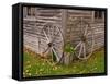 Old Wooden Barn with Wagon Wheels in Rural New England, Maine, USA-Joanne Wells-Framed Stretched Canvas