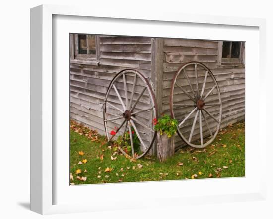 Old Wooden Barn with Wagon Wheels in Rural New England, Maine, USA-Joanne Wells-Framed Premium Photographic Print