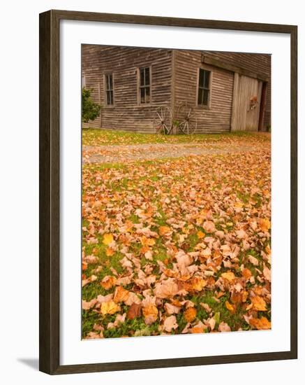 Old Wooden Barn with Wagon Wheels in Rural New England, Maine, USA-Joanne Wells-Framed Photographic Print