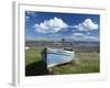 Old Wooden Fishing Boat on a Grassy Bank with Lindisfarne Harbour and Lindisfarne Castle, Holy Isla-Lee Frost-Framed Photographic Print