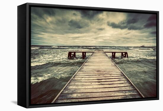 Old Wooden Jetty, Pier, during Storm on the Sea. Dramatic Sky with Dark, Heavy Clouds. Vintage-Michal Bednarek-Framed Stretched Canvas