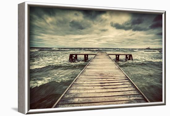 Old Wooden Jetty, Pier, during Storm on the Sea. Dramatic Sky with Dark, Heavy Clouds. Vintage-Michal Bednarek-Framed Photographic Print