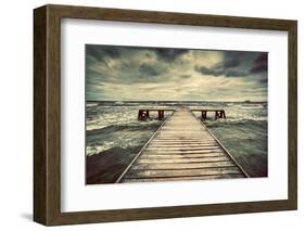 Old Wooden Jetty, Pier, during Storm on the Sea. Dramatic Sky with Dark, Heavy Clouds. Vintage-Michal Bednarek-Framed Photographic Print