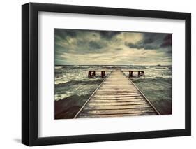 Old Wooden Jetty, Pier, during Storm on the Sea. Dramatic Sky with Dark, Heavy Clouds. Vintage-Michal Bednarek-Framed Photographic Print