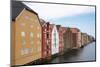 Old wooden warehouses on the Nidelva River in Trondheim, Trondelag-Ellen Rooney-Mounted Photographic Print