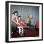 Older Sister Helps Her Sister with New Bike, Ca. 1967-null-Framed Photographic Print