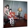 Older Sister Helps Her Sister with New Bike, Ca. 1967-null-Mounted Photographic Print
