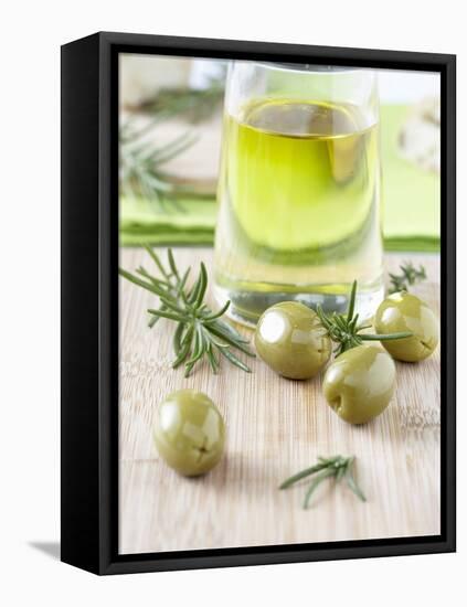 Olive Oil, Green Olives and Rosemary on Chopping Board-Jo Kirchherr-Framed Stretched Canvas