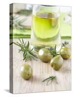 Olive Oil, Green Olives and Rosemary on Chopping Board-Jo Kirchherr-Stretched Canvas