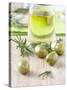 Olive Oil, Green Olives and Rosemary on Chopping Board-Jo Kirchherr-Stretched Canvas