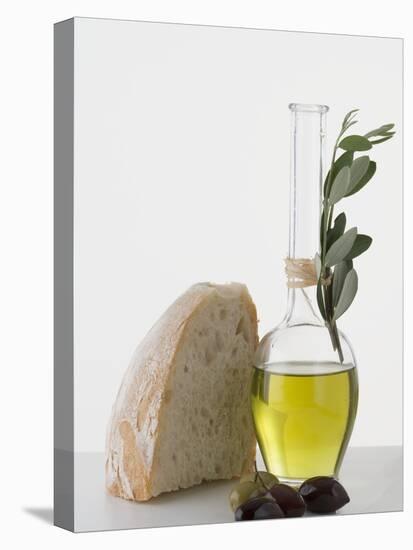 Olive Oil in Carafe, Olives and Piece of White Bread-null-Stretched Canvas