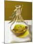 Olive Oil in Carafe with Olive Branch-null-Mounted Photographic Print