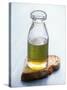 Olive Oil in Small Bottle and a Slice of Bread-Joerg Lehmann-Stretched Canvas