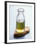 Olive Oil in Small Bottle and a Slice of Bread-Joerg Lehmann-Framed Photographic Print