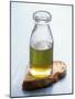 Olive Oil in Small Bottle and a Slice of Bread-Joerg Lehmann-Mounted Photographic Print