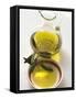 Olive Oil with Olive Branch in Bowl in Front of Carafe-null-Framed Stretched Canvas