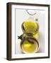 Olive Oil with Olive Branch in Bowl in Front of Carafe-null-Framed Photographic Print