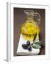 Olive Sprig with Black Olives, Carafe of Olive Oil Behind-null-Framed Photographic Print