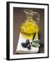 Olive Sprig with Black Olives, Carafe of Olive Oil Behind-null-Framed Photographic Print