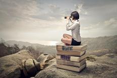 Beautiful Woman Sitting On A Pile Of Old Books Watching With Binoculars-olly2-Art Print