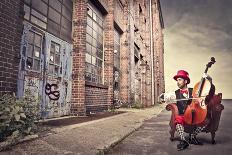 Young Man Sitting On An Armchair On A City Street And Playing The Cello-olly2-Art Print