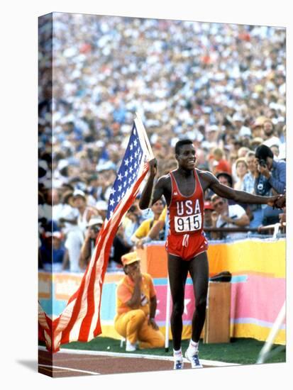 Olympic Games in Los Angeles, 1984 : 100M : Carl Lewis Winner-null-Stretched Canvas