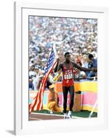 Olympic Games in Los Angeles, 1984 : 100M : Carl Lewis Winner-null-Framed Photo