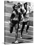 Olympic Games in Los Angeles, 1984 : American Evelyn Ashford Winning the 100M, on R : Heather Oaks-null-Stretched Canvas