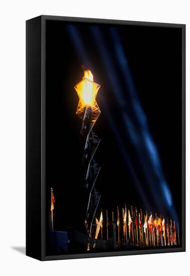 Olympic torch at night during the 2002 Winter Olympics, Salt Lake City, UT-null-Framed Stretched Canvas
